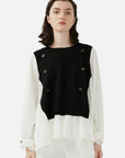Stylish Black and White Knit Patchwork Shirt: A striking fashion contrast with ruffled edges.