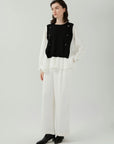 Black and White Contrast Knit Combination Shirt: Mixing modernity with classic colors.