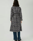 An elegant and fashionable look with a belted double-breasted overcoat