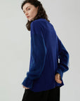 Sophisticated high-neck sweater with unique mesh sleeve design