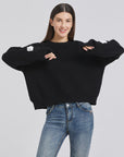 Embroidered ghost sweater: Bringing humor to Halloween.