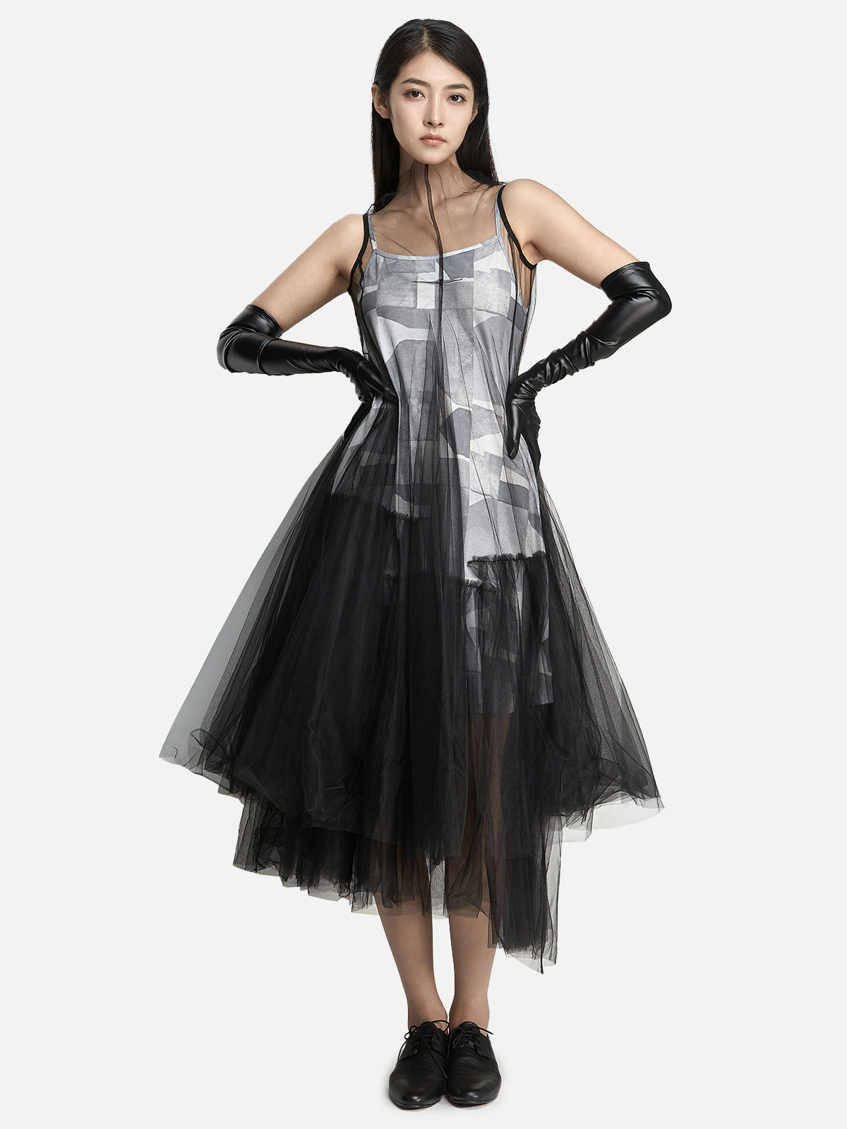 Black tulle overlay dress with geometric print inner layer