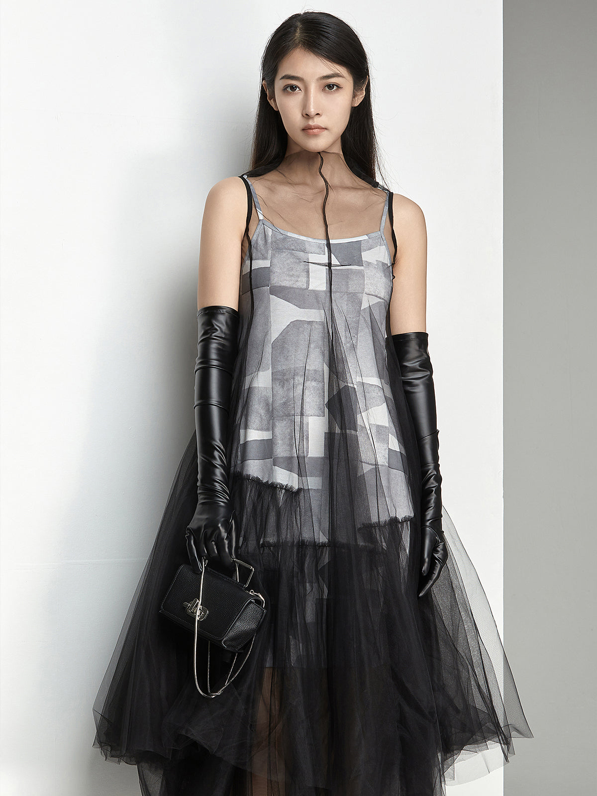 Black tulle overlay dress with geometric print inner layer
