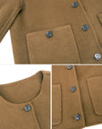 Professional attire elevated – the round-necked, single-breasted camel woolen coat exudes timeless style