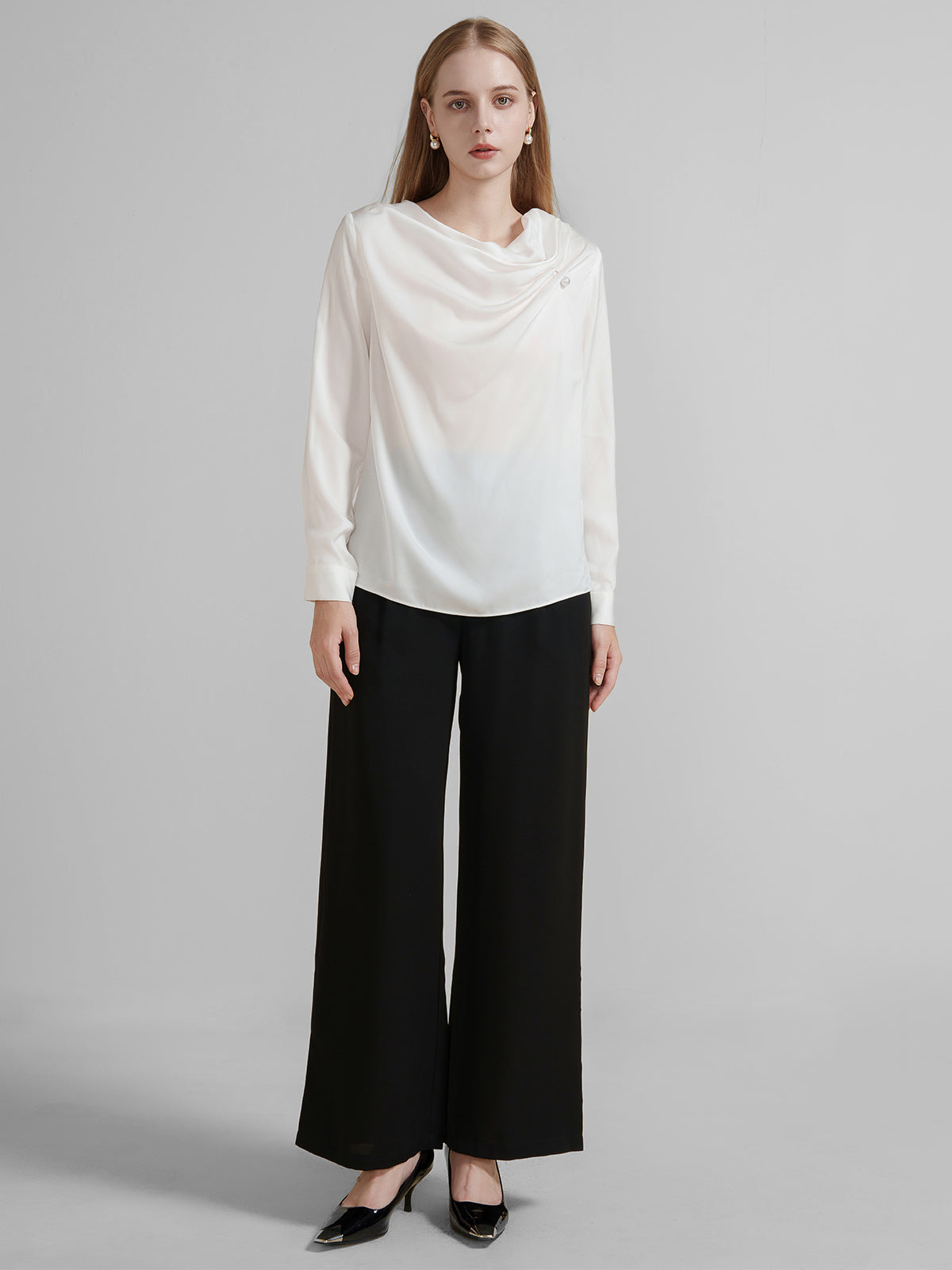Women's white silky top with a stylish cowl neck and subtle pearl accent
