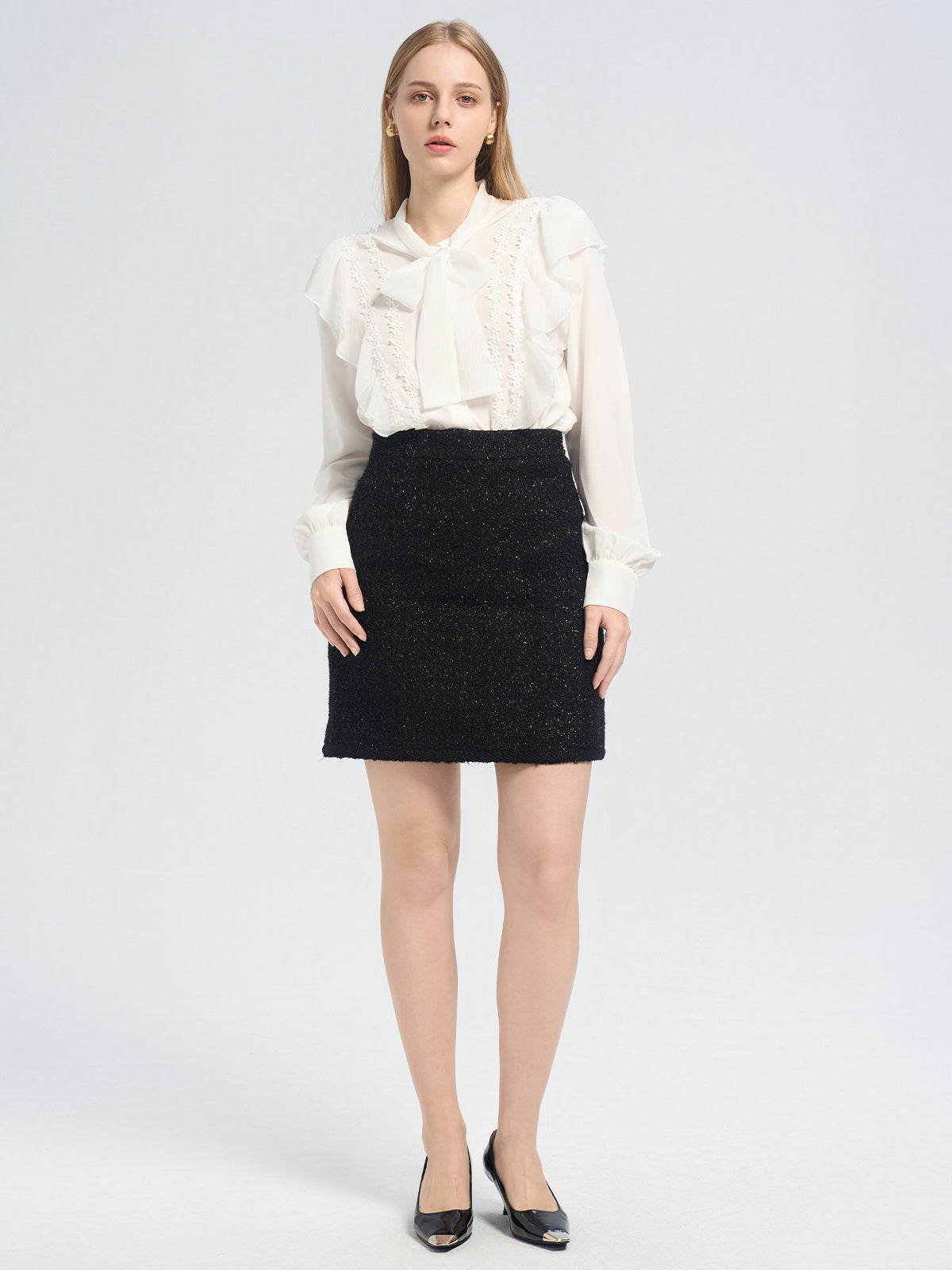 Chanel-inspired bouclé skirt in black, claasic and elegant