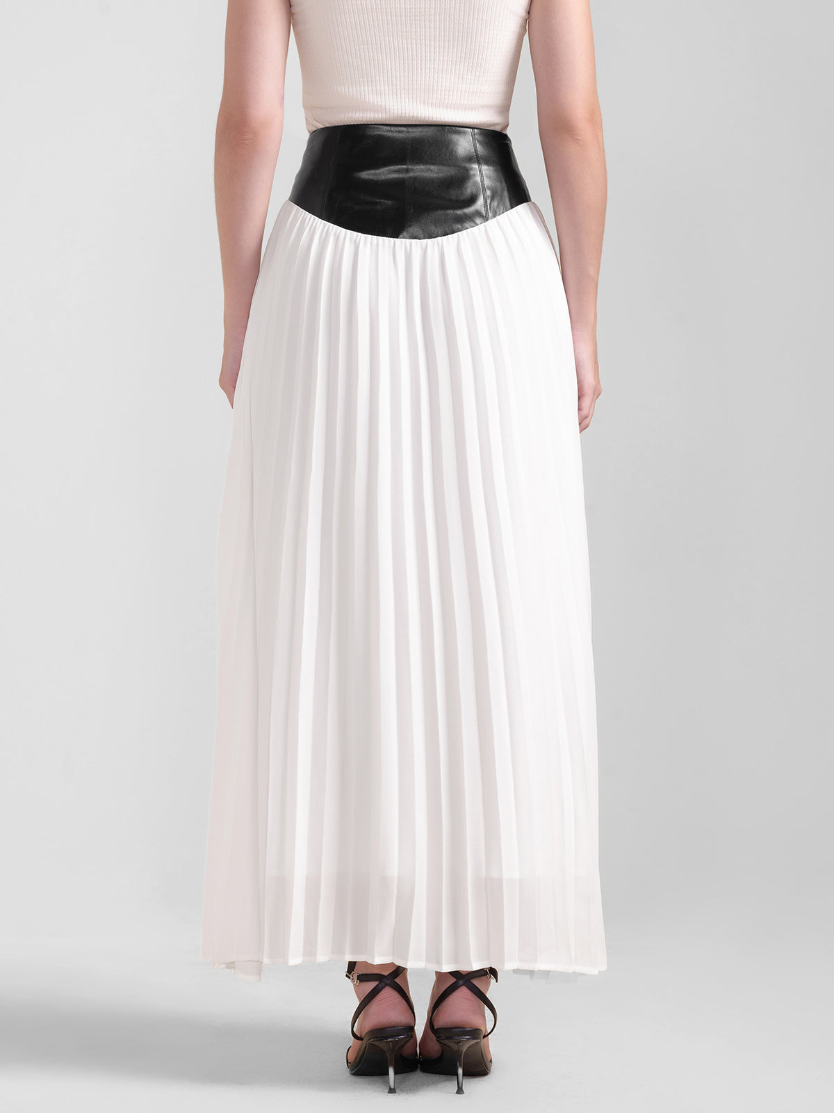 S·DEER black and white pleated midi skirt with faux leather waist, contrast design, and flowy silhouette for women