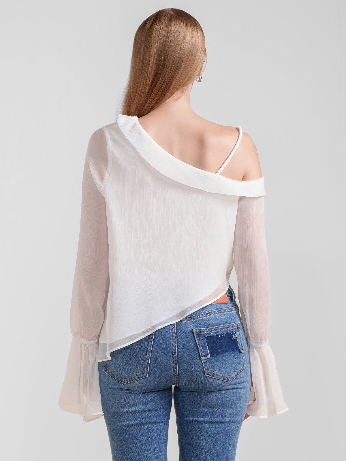 Chic asymmetrical white chiffon blouse for women, featuring a draped neckline and semi-sheer fabric