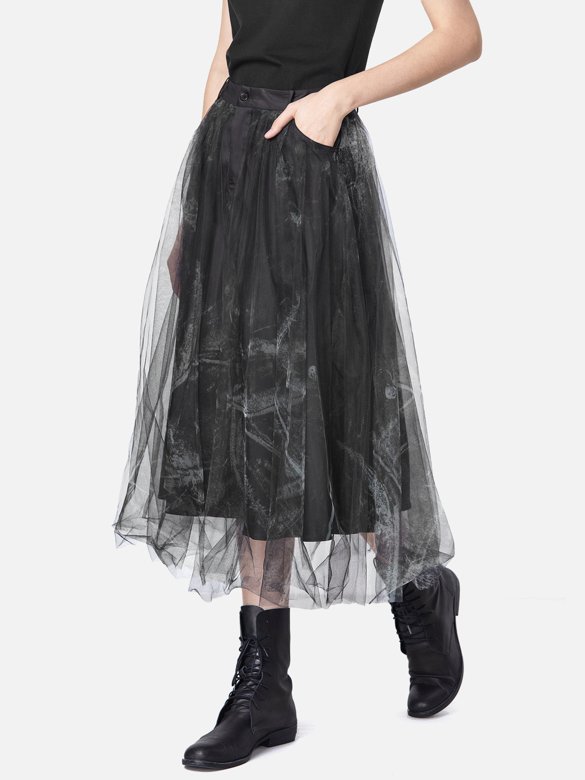 Flat-lay of black midi skirt with tulle overlay and belt S·DEER