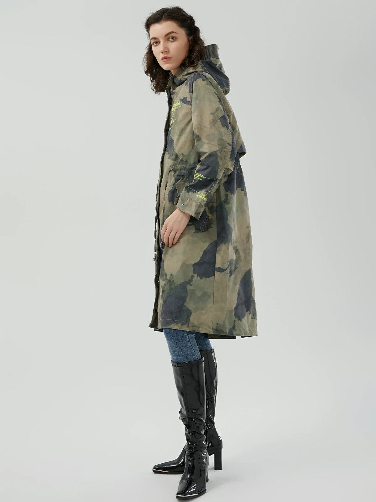 Loose-fit, long trench coat featuring a waist-cinched design for a fashionable look