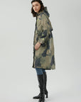 Loose-fit, long trench coat featuring a waist-cinched design for a fashionable look