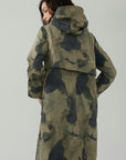Fashion-forward outerwear with a trendy blend of camouflage and fluorescent letter elements