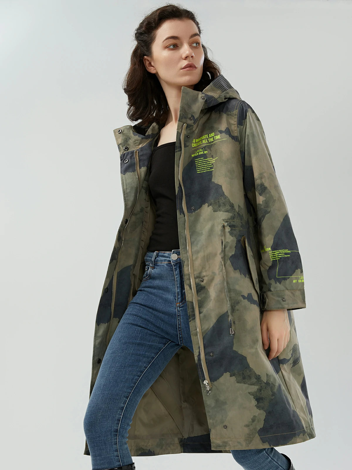 Casual-chic trench coat with a waist-cinched design and eye-catching camouflage print
