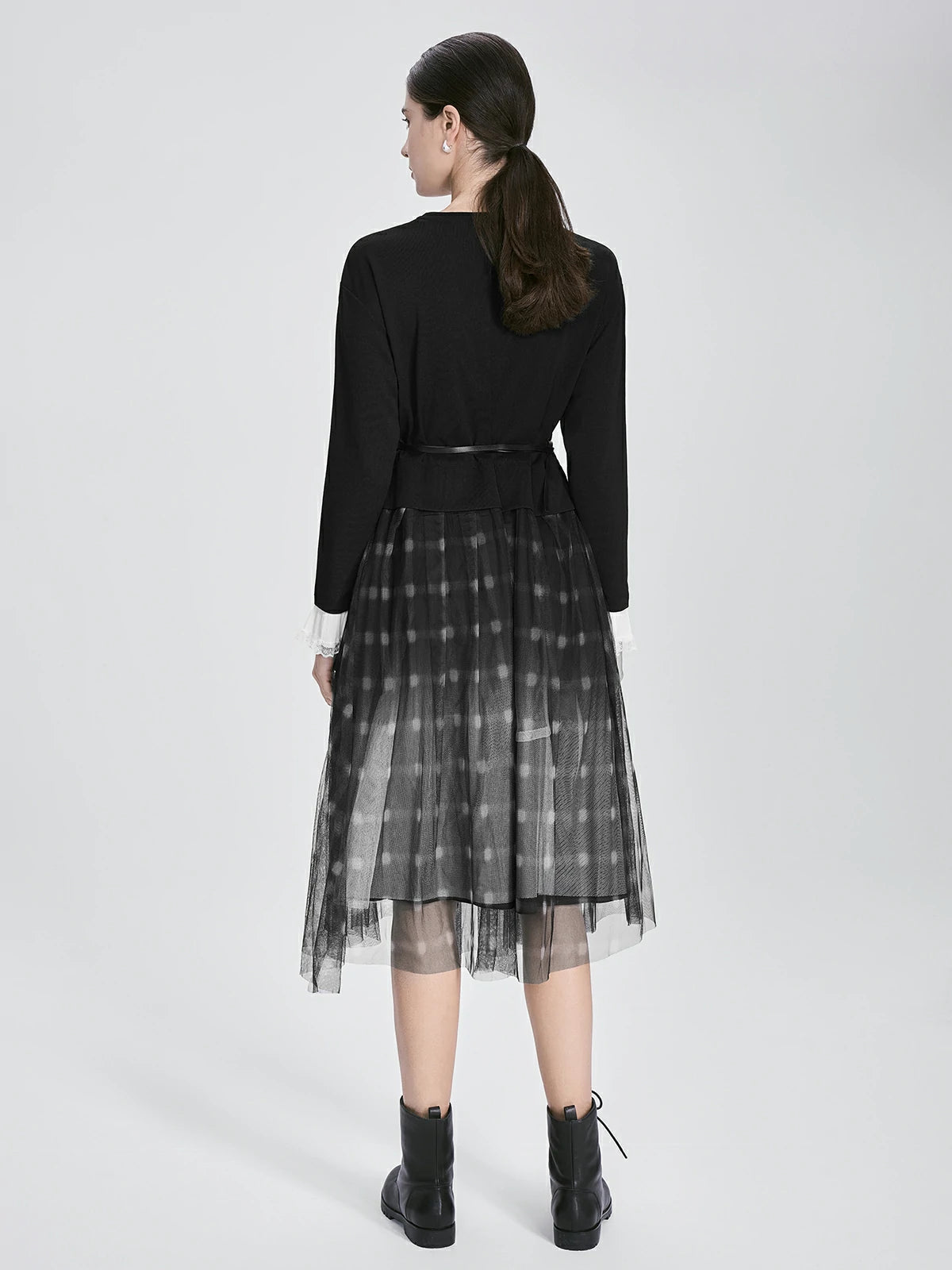 Back view of S·DEER black dress with long sleeves and a belt accent at the waist