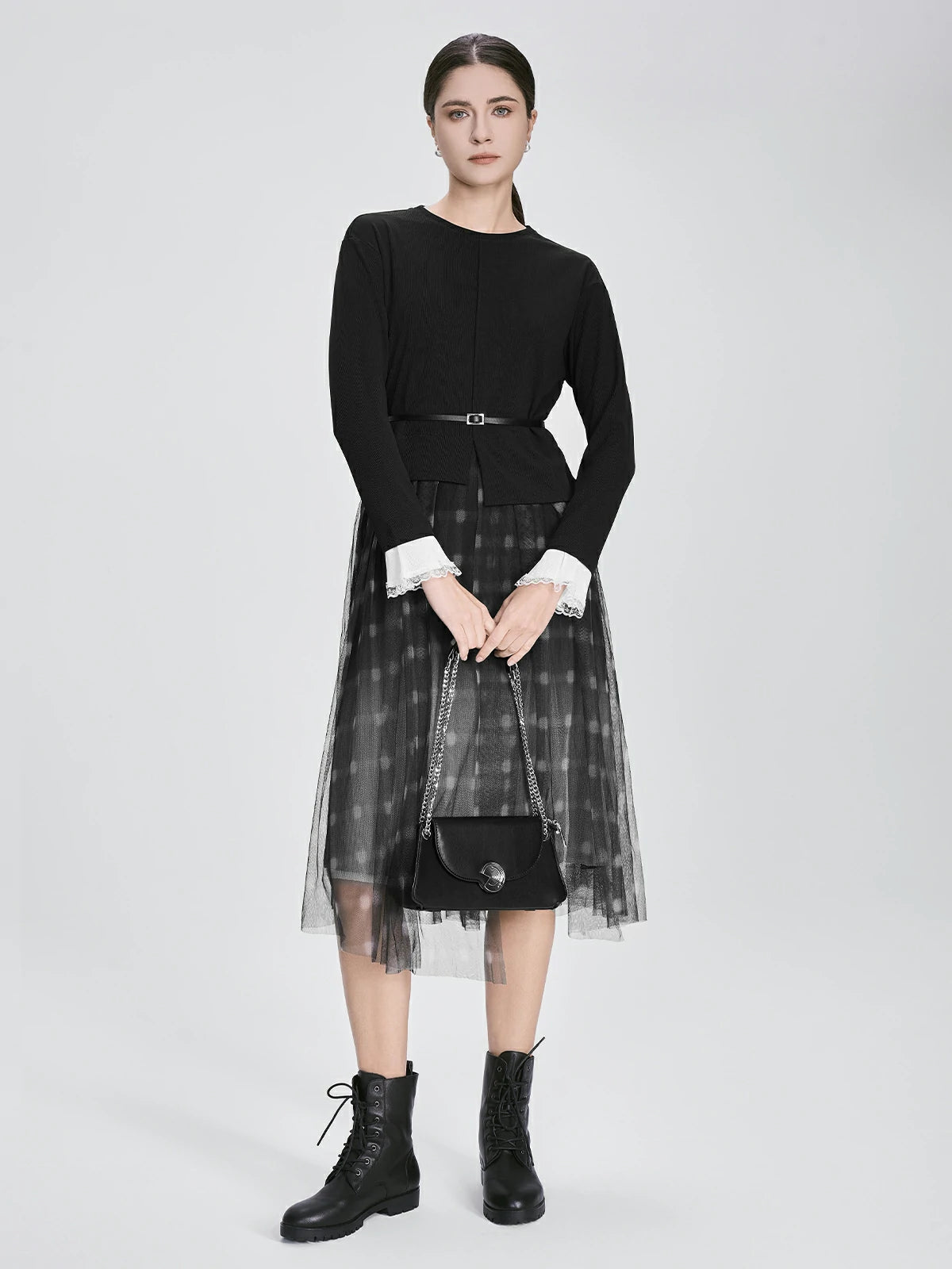 S·DEER black dress with a belted waist, long sleeves, and a sheer checkered tulle skirt