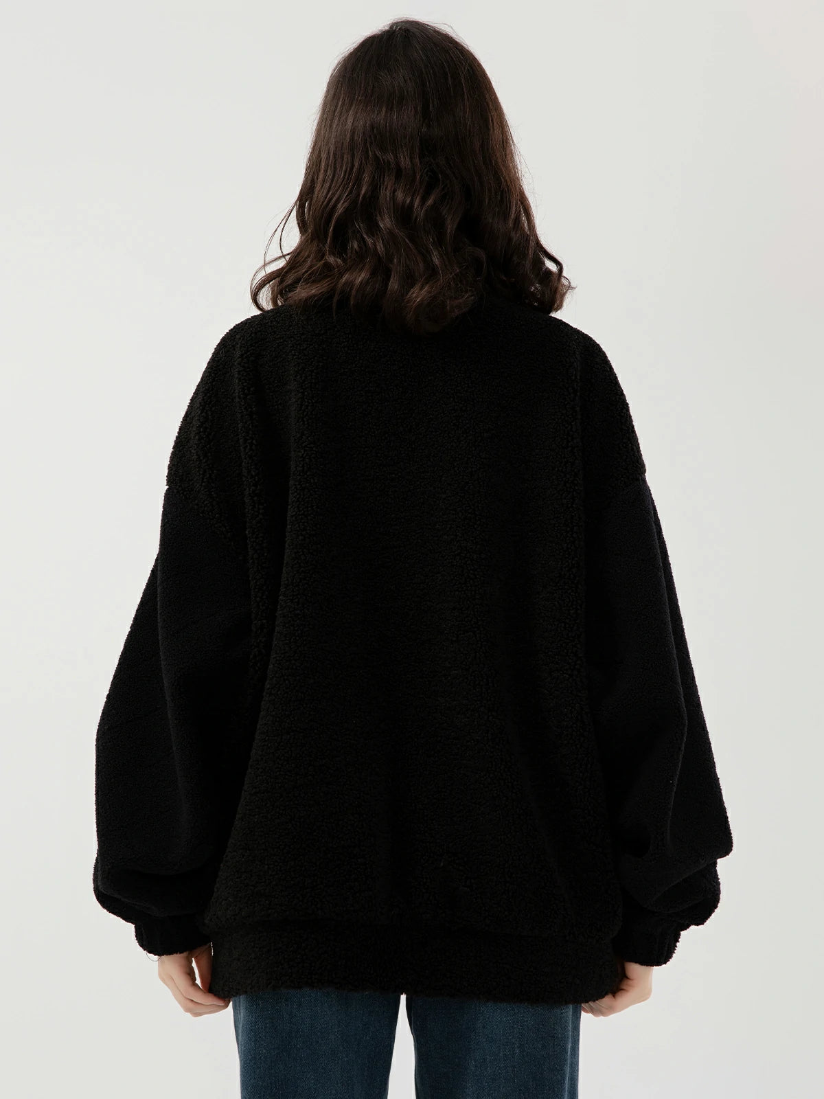 Staying warm and stylish: the charm of a black fleece zip jacket