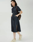 Symmetrical Pocket Detail on Denim Shirt Dress: Practical and stylish.