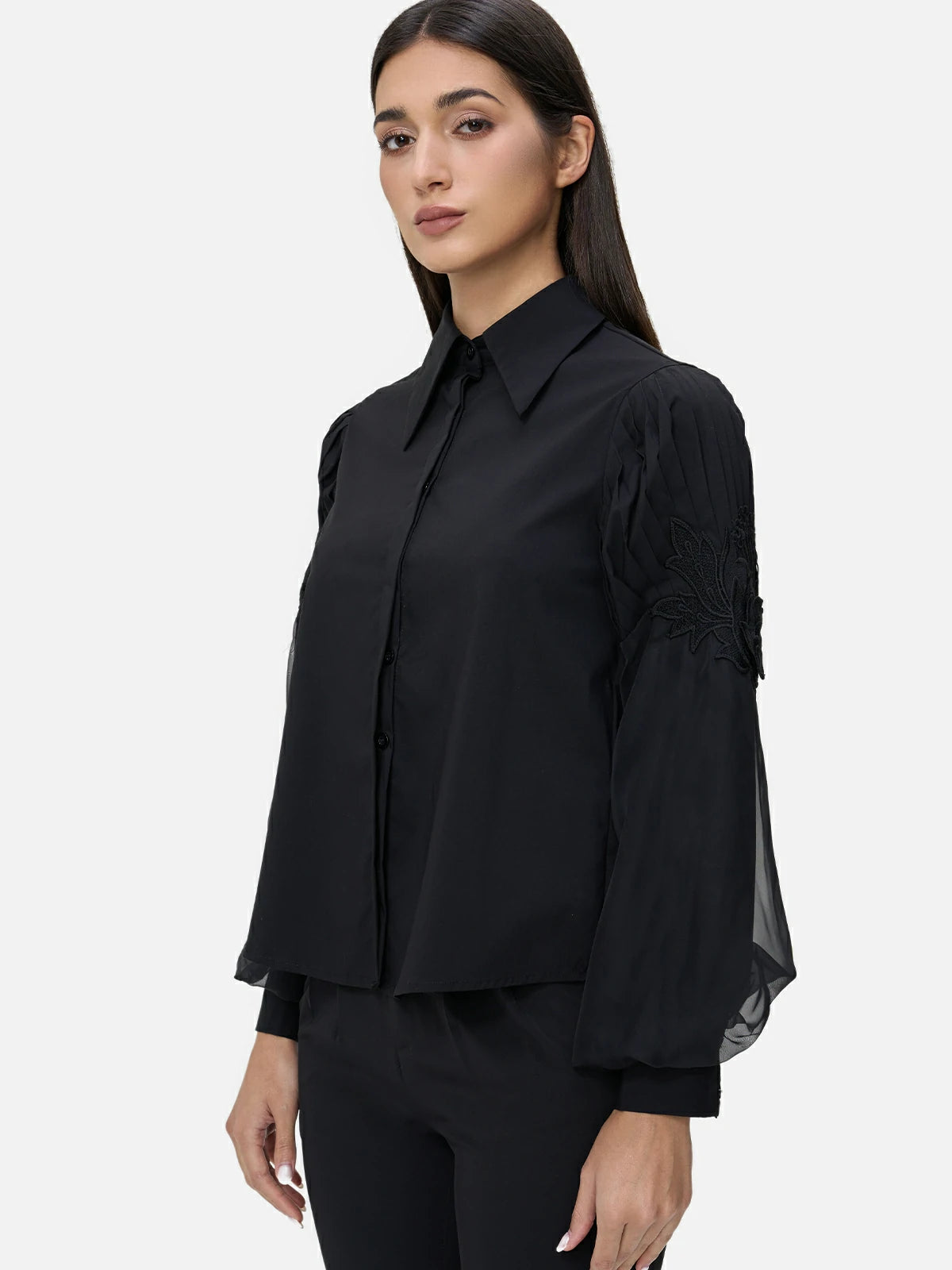 Unique design featuring elegant pleated sleeves