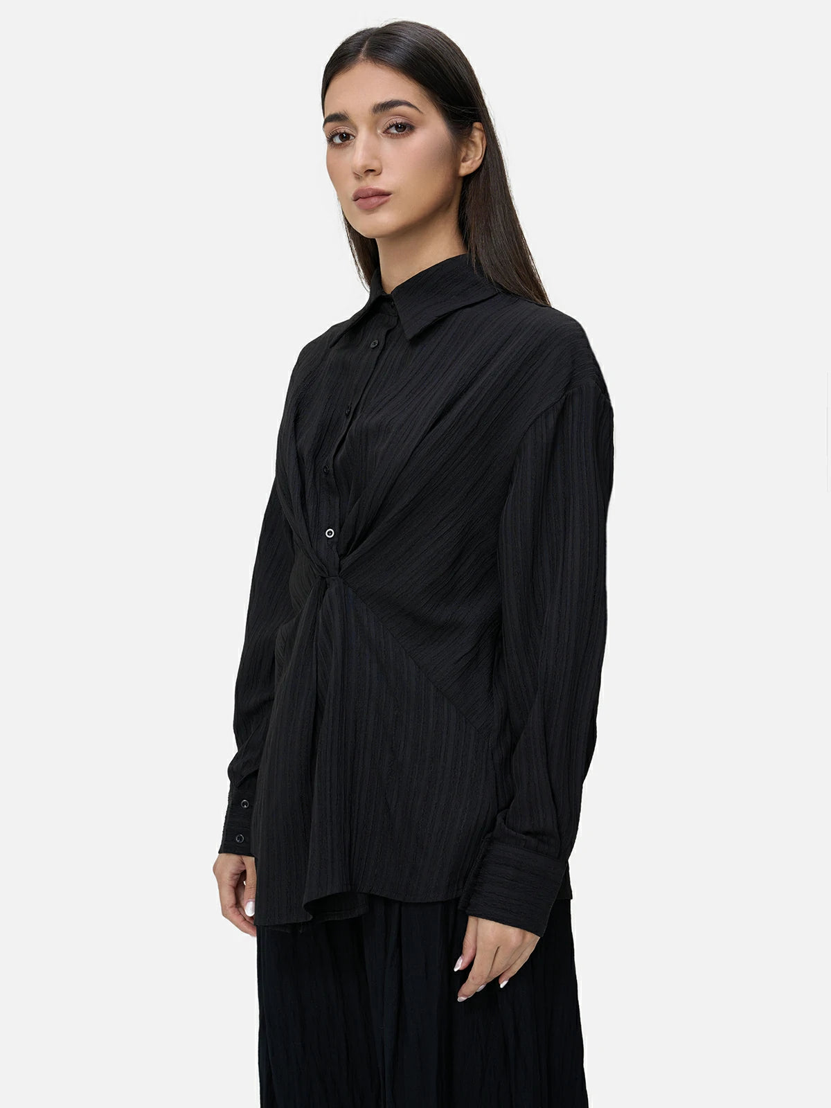 Fashion-forward feel with a front knot design on this black shirt