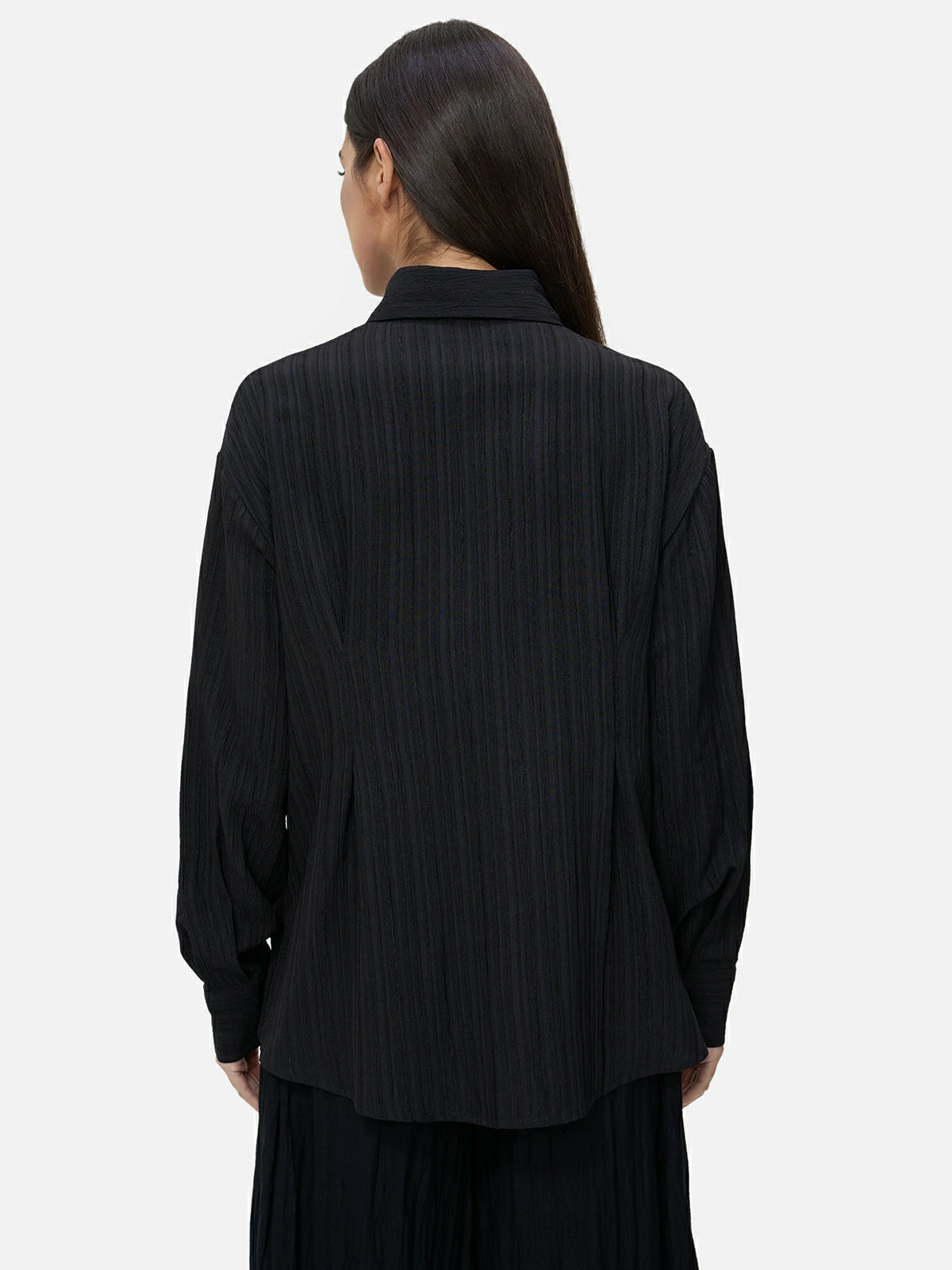 Distinctive black shirt with intricate striped patterns