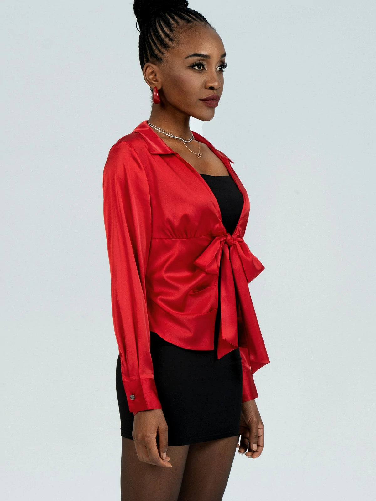 Elegant red shirt featuring satin fabric and front tie detail
