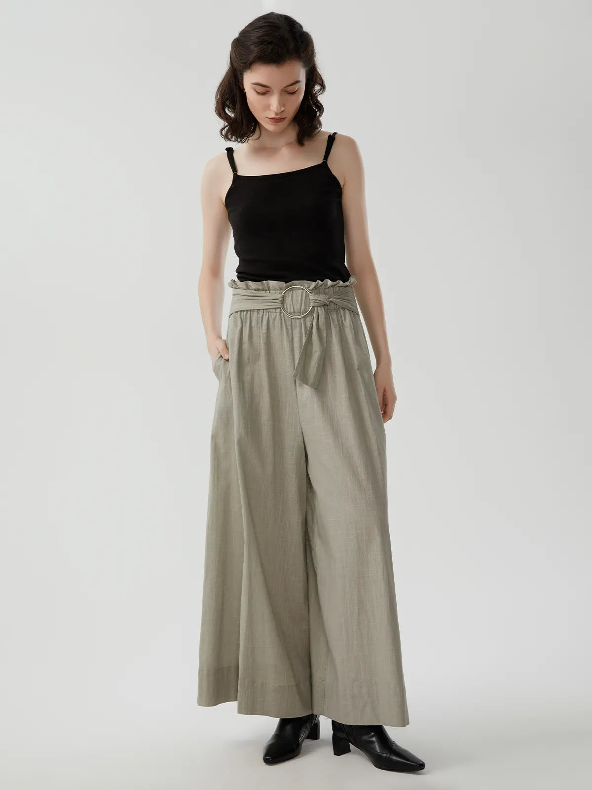 Experience the comfort of lightweight linen in these high-waisted trousers