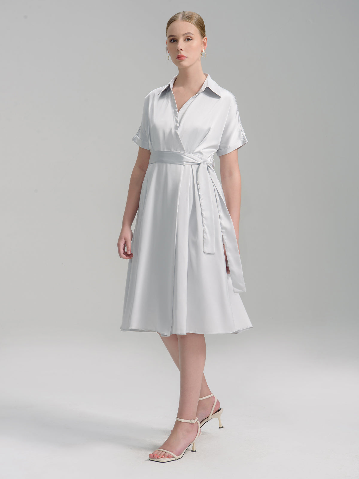 S·DEER silver wrap dress featuring a flattering A-line silhouette and cinched waist with a belt, ideal for brunch or daytime events