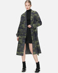 Elevate your wardrobe with this gray and green trench coat, featuring irregular prints that add an artistic flair, creating a unique and stylish ensemble.