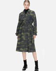 Make a fashion statement with this trench coat, showcasing an irregular green print on a gray backdrop, providing an artful and unique touch to your wardrobe.