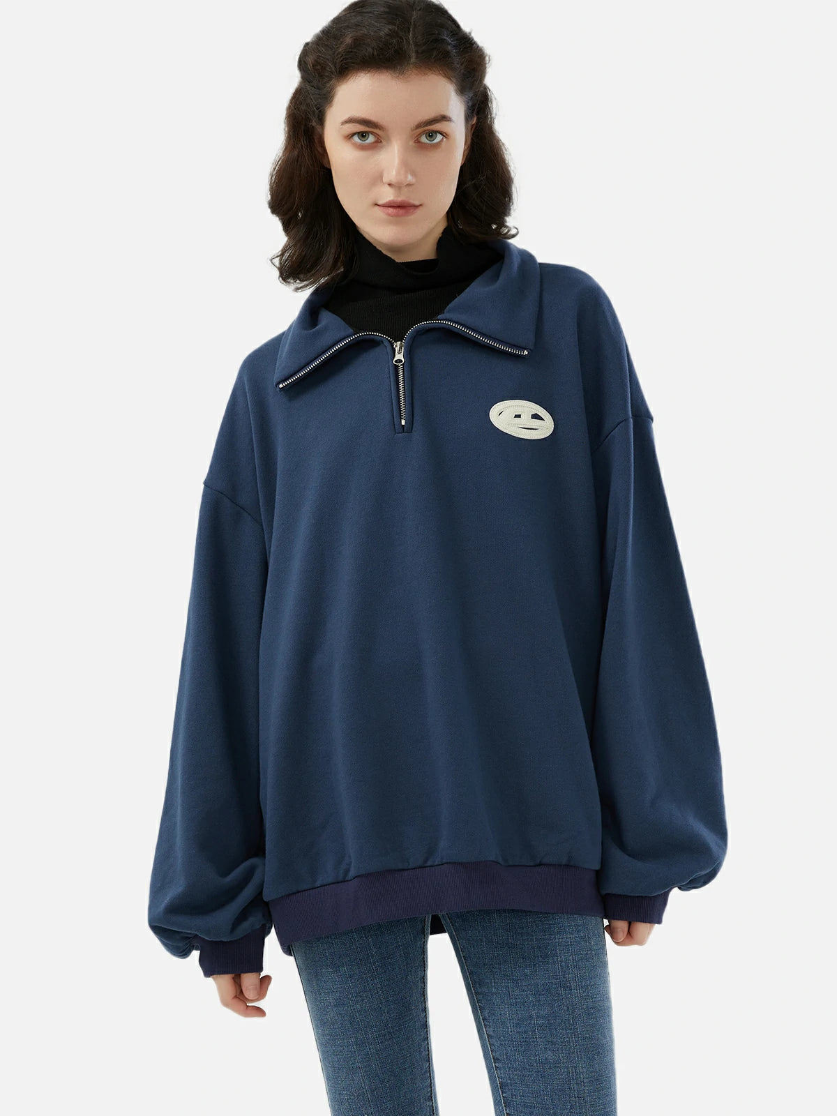 Stylish navy blue pullover with a relaxed fit, perfect for casual occasions