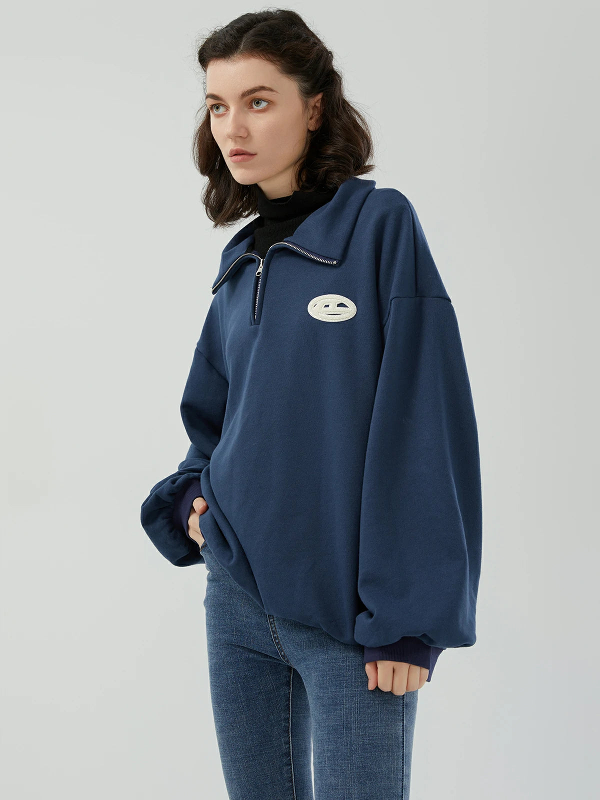 Fashionable and comfortable half-zip sweatshirt in a soothing navy blue shade