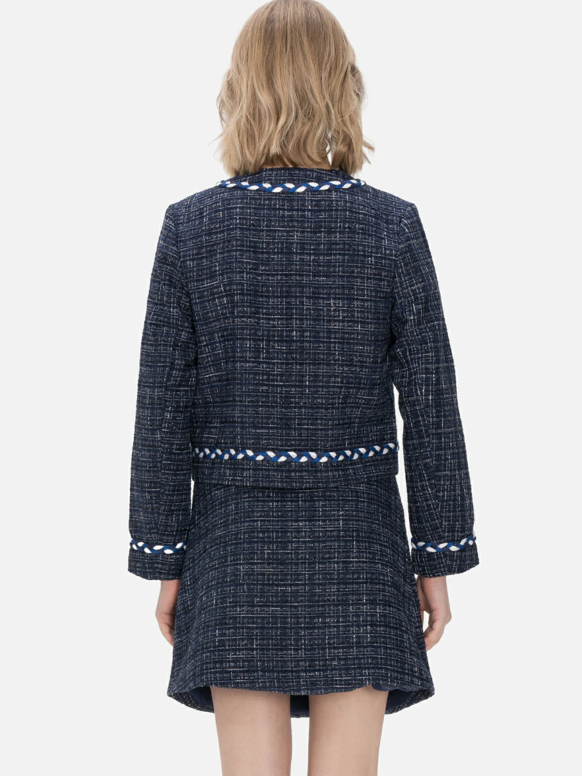 Embrace sophistication in this navy blue plaid jacket adorned with camellia-shaped buttons, offering a classic and elegant look tailored to showcase the feminine silhouette.