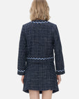 Embrace sophistication in this navy blue plaid jacket adorned with camellia-shaped buttons, offering a classic and elegant look tailored to showcase the feminine silhouette.