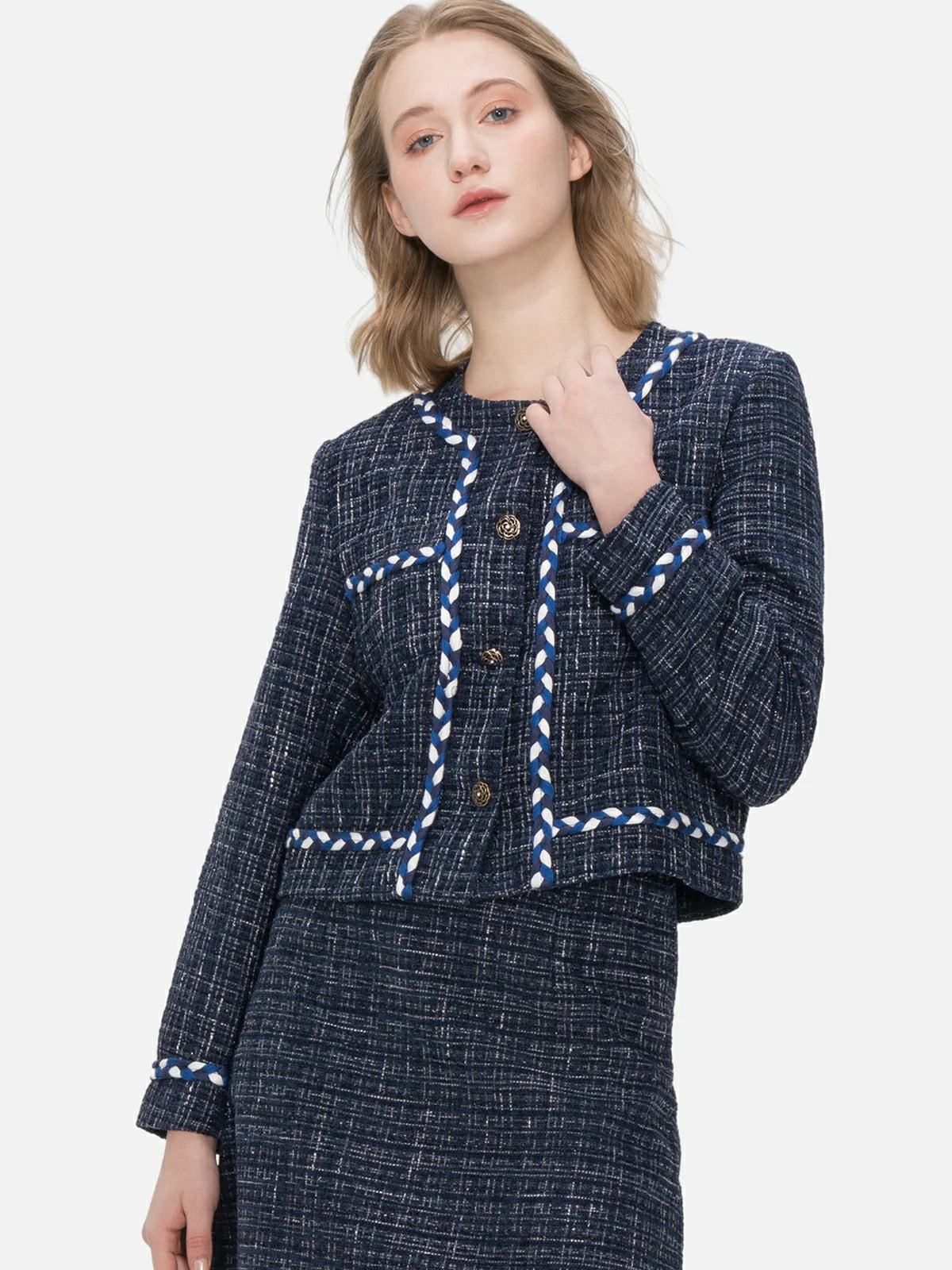 Make a fashion statement with this versatile and sophisticated navy blue plaid jacket, designed with camellia-shaped buttons and a tailored silhouette.