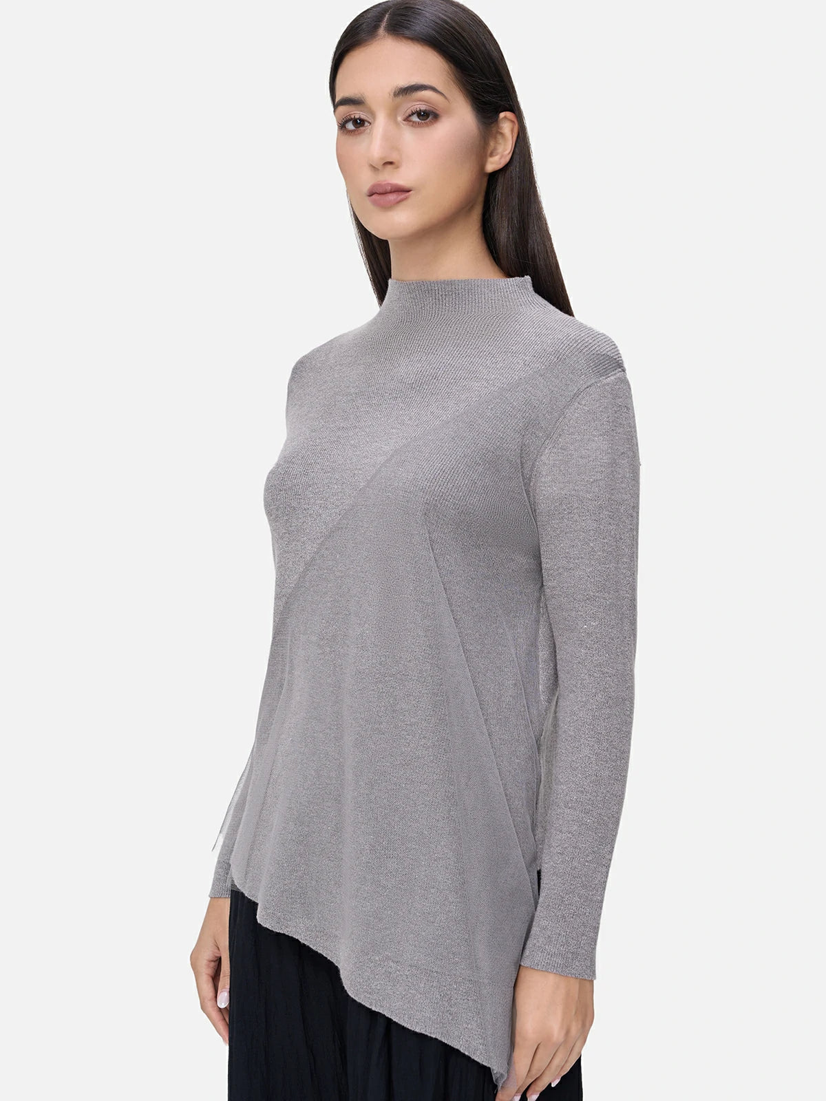 Fashionable gray semi-turtleneck sweater with asymmetric design and lace mesh, creating a unique look.
