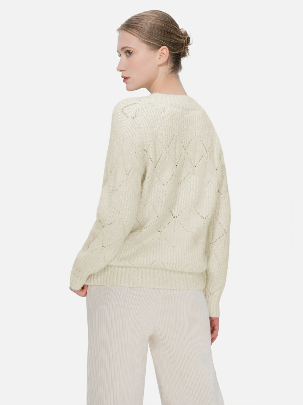Tailored-fit diamond-cutout sweater, perfect for showcasing individual taste in fashion.
