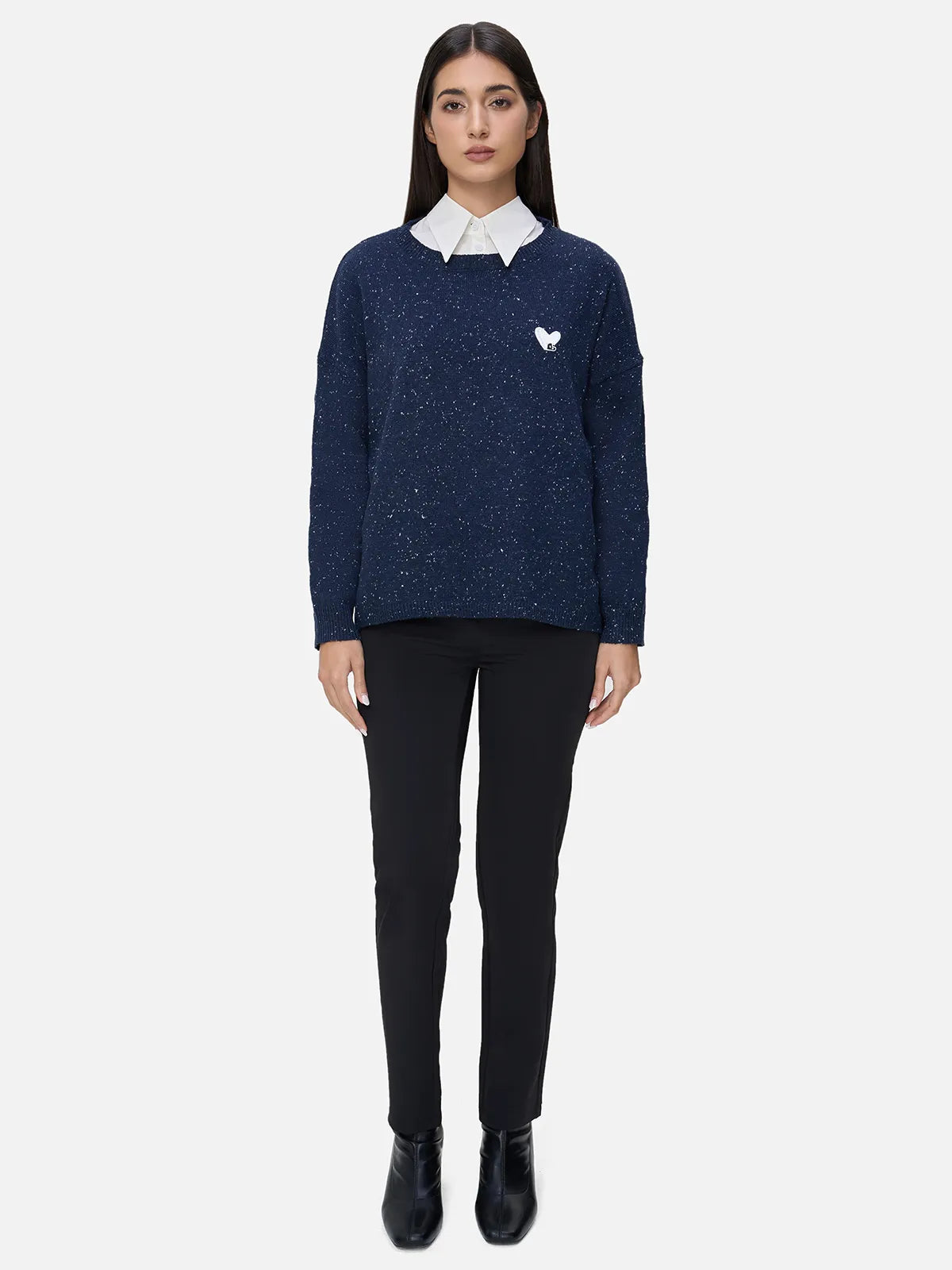 Make a style statement with this stylish navy sweater set, complemented by a white shirt adorned with playful polka dot decorations, creating a fashionable and cute ensemble.