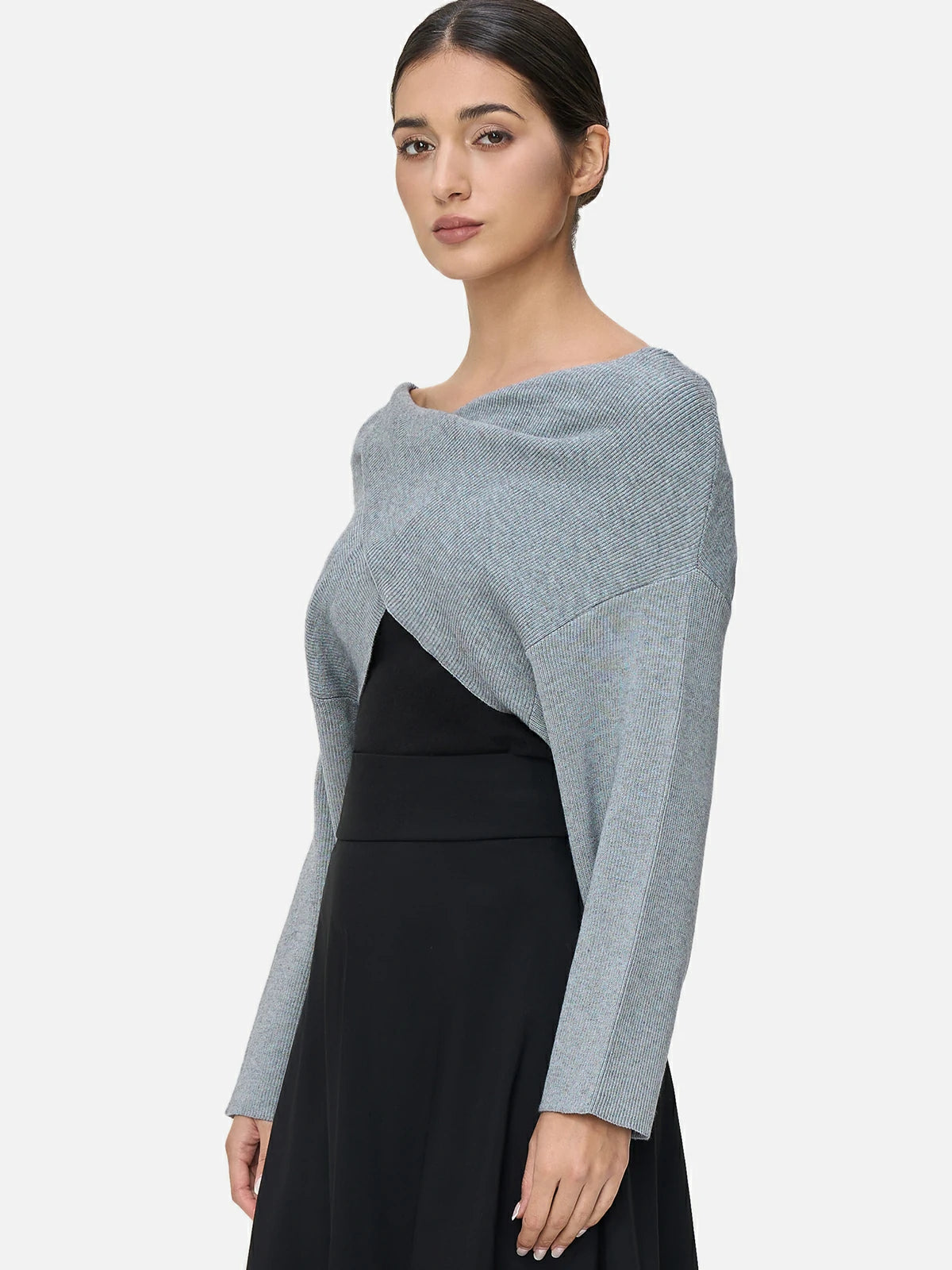 Fashion-Forward Statement: Make a fashion-forward statement with this unique knit sweater.