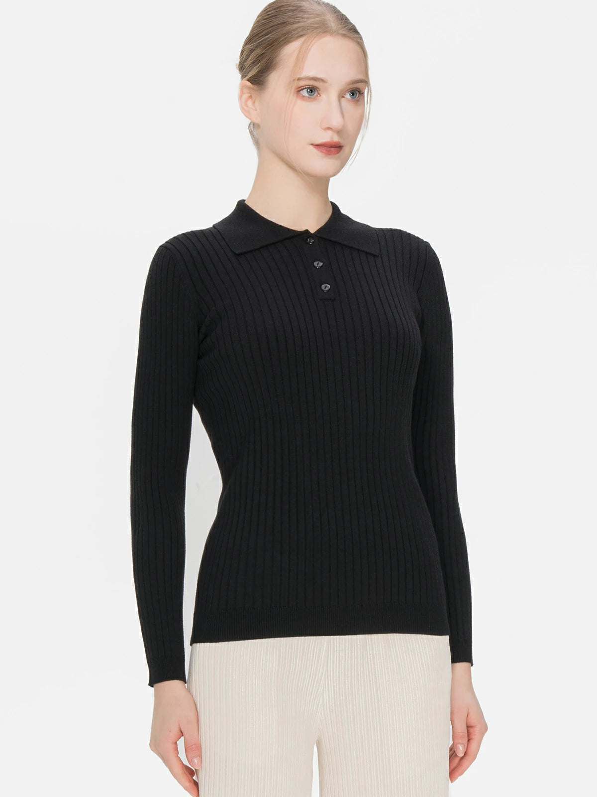 Elevate your style with this black sweater featuring a polo collar and a buttoned design.