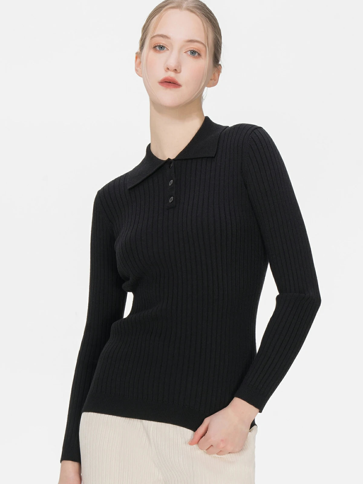 Make a statement in this stylish black knitwear, boasting a polo collar, buttoned detailing, and a slim fit, offering both sophistication and comfort.