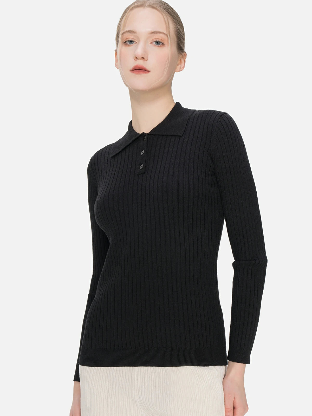 Redefine casual elegance with this black sweater, accentuated by a classic polo collar, a buttoned front design, and a flattering slim fit.
