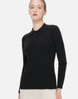 Redefine casual elegance with this black sweater, accentuated by a classic polo collar, a buttoned front design, and a flattering slim fit.