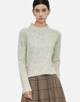 Cozy Loose-Fit Knit Pullover with Playful Polka Dot Pattern and Stylish Ribbed Collar