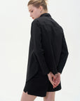 Classic and tailored black shirt with a distinctive chest panel, suitable for elevating both work and weekend ensembles.