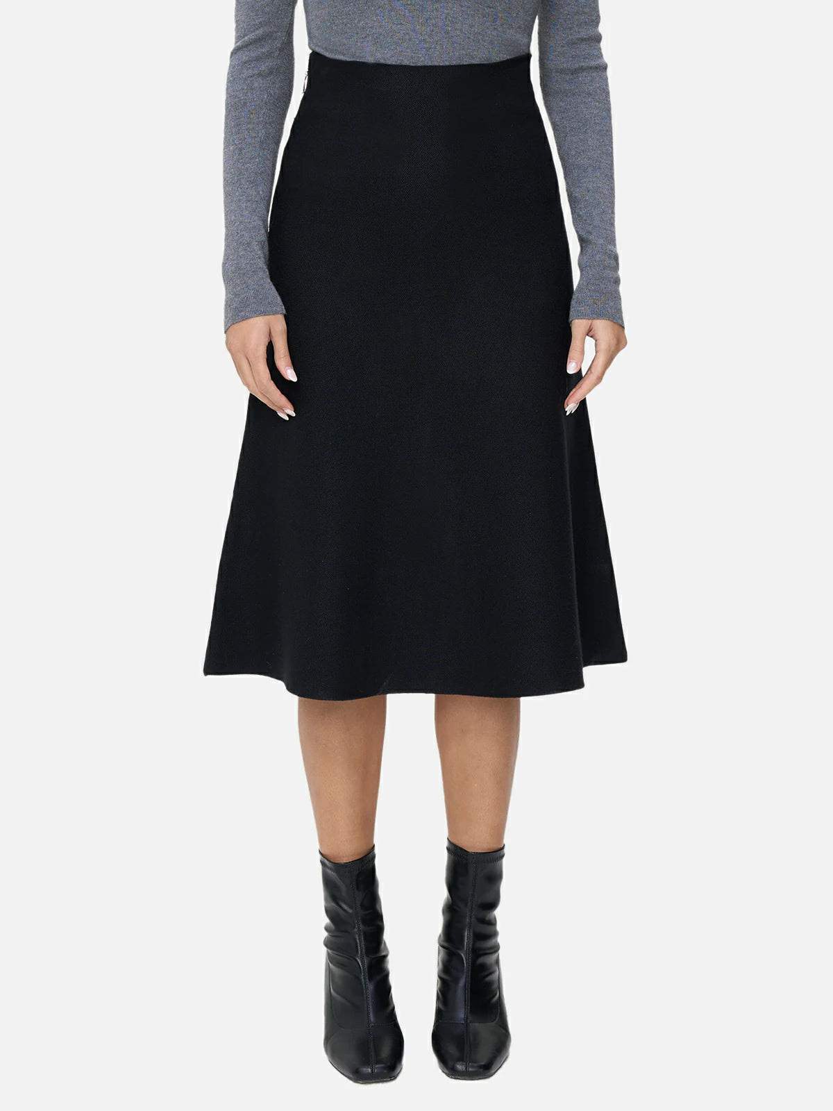 Elegant A-line Midi Skirt: Elevate your wardrobe with this elegant black knit A-line midi skirt.