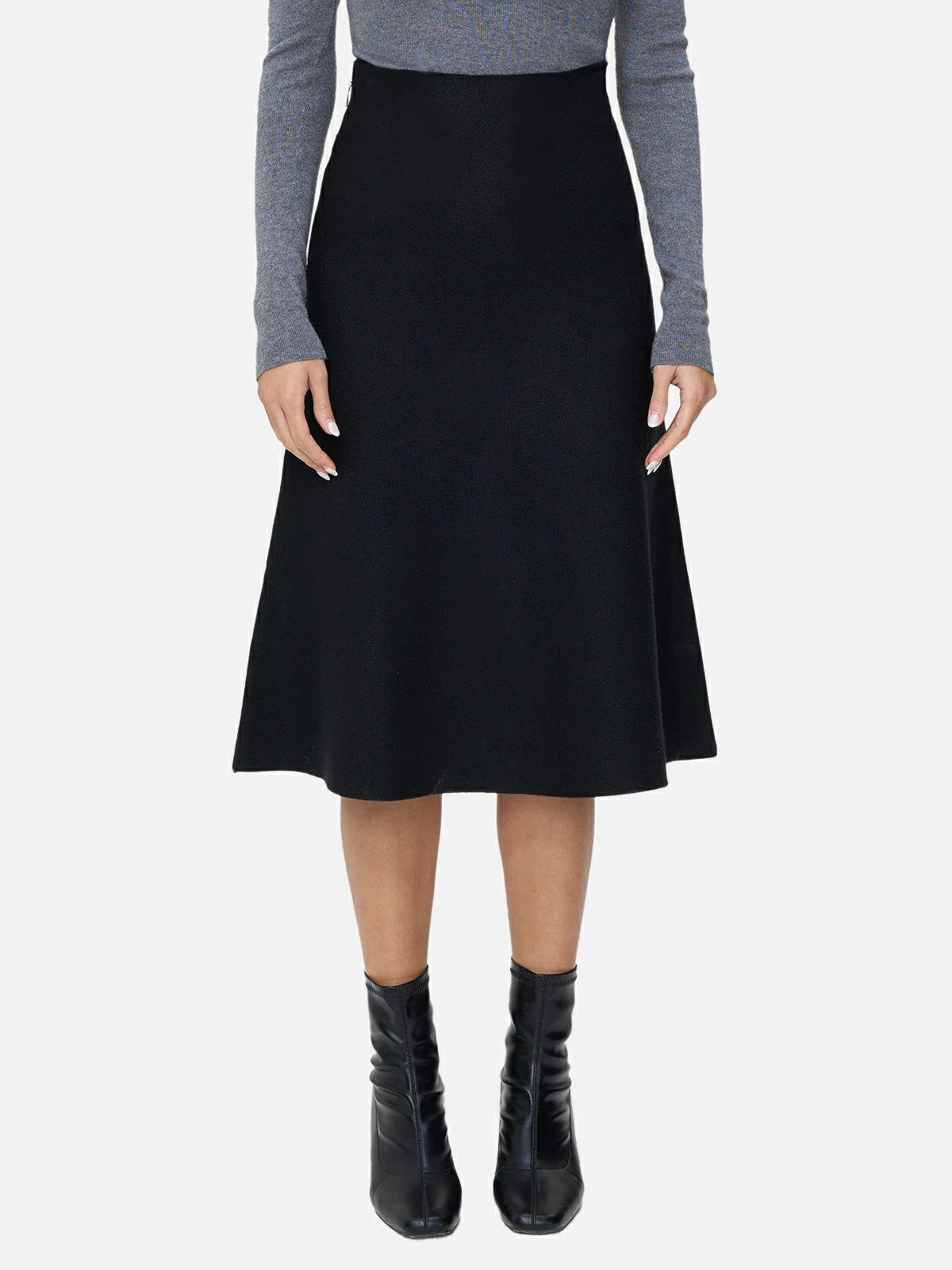 Elegant A-line Midi Skirt: Elevate your wardrobe with this elegant black knit A-line midi skirt.