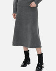 Elevate your casual wardrobe with this knitted maxi skirt, featuring an elastic high-waist and A-line silhouette.