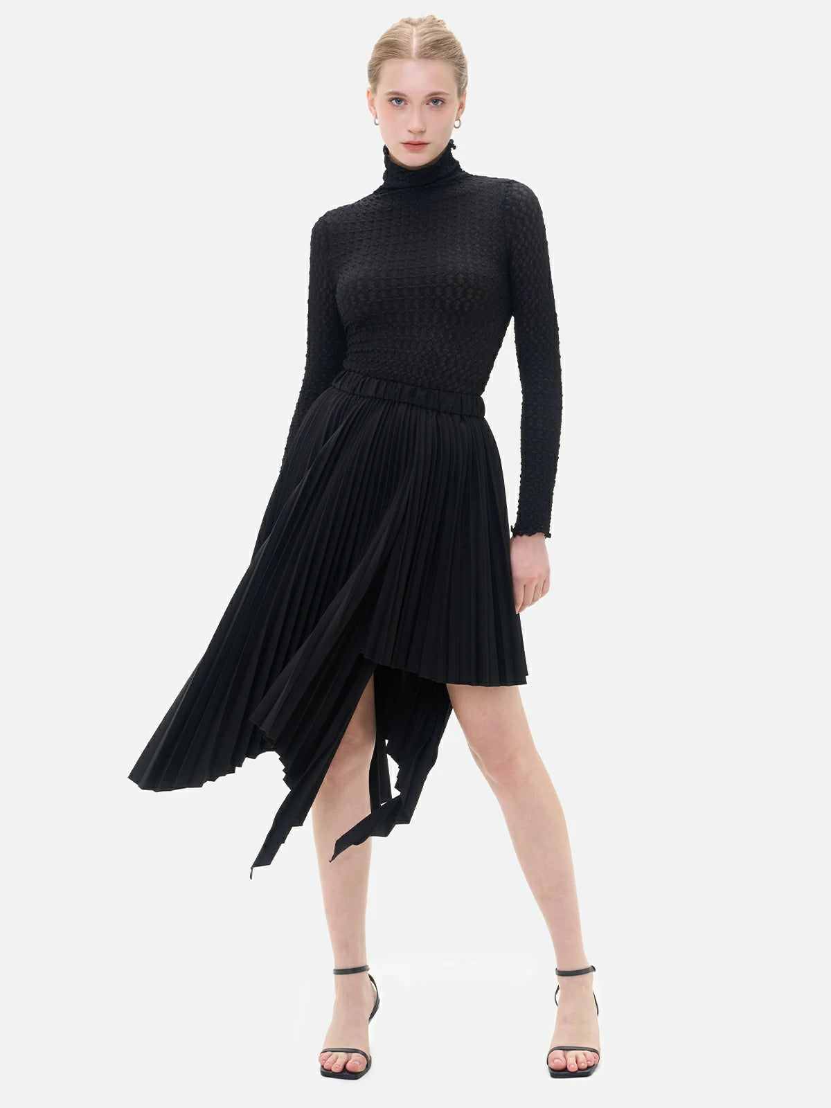 Black irregular-cut pleated midi skirt, stylish and chic