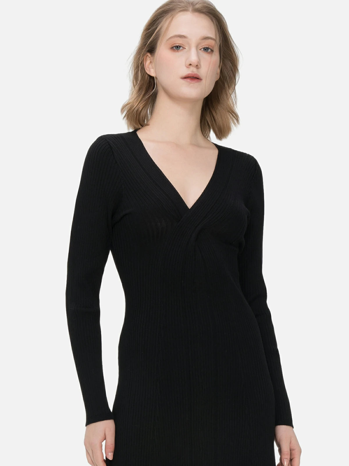 Elevate your style with this black knit midi dress featuring a cross V-neck design, body-hugging silhouette, and intricate knit details.