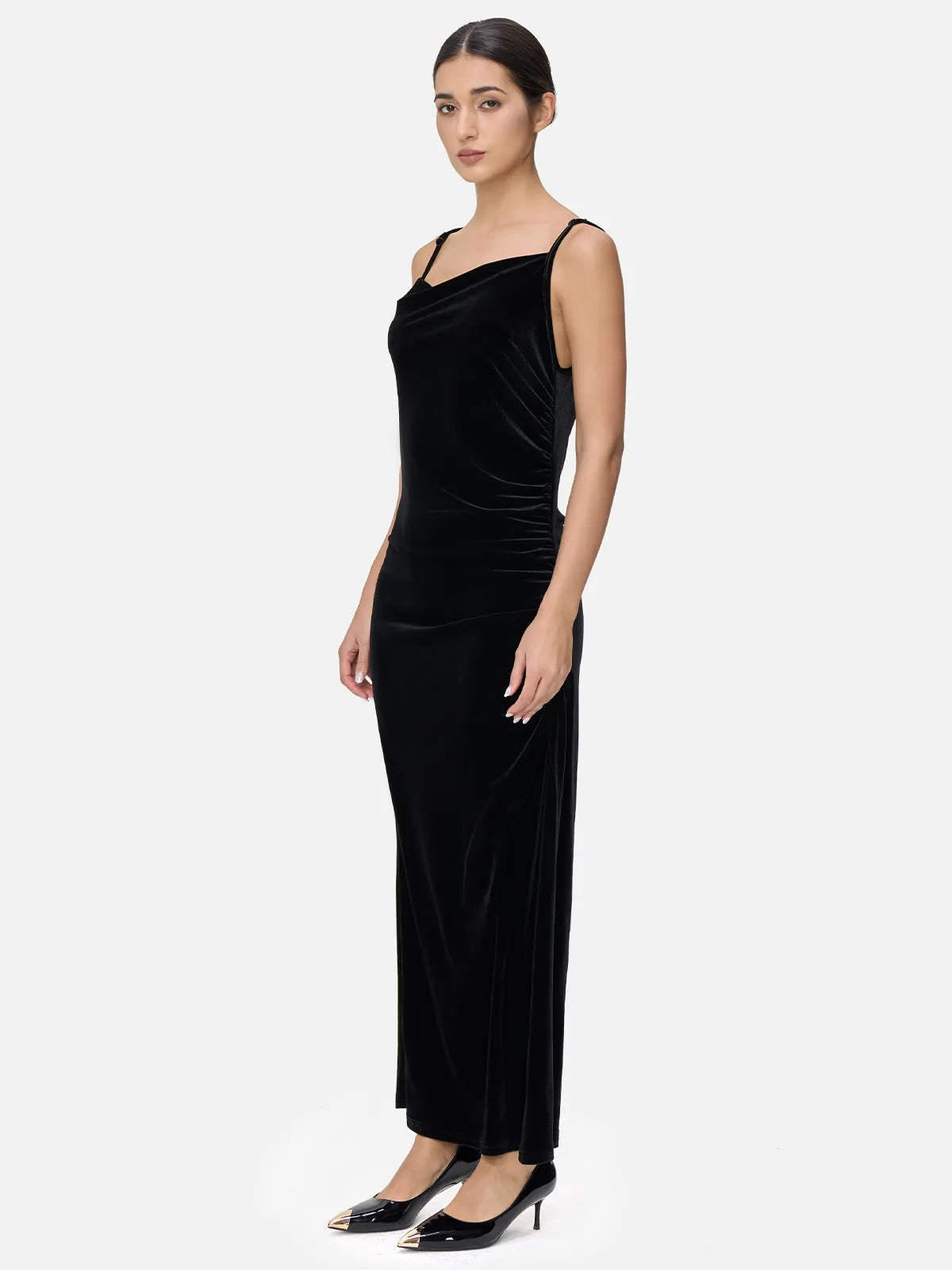 Luxurious and sophisticated velvet spaghetti strap maxi dress with irregular V-neck design, featuring a fluid layered effect